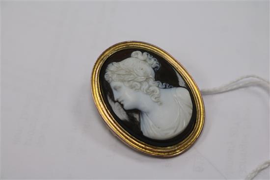 A mounted hardstone oval cameo, carved with the bust of a lady to dexter, 42mm.